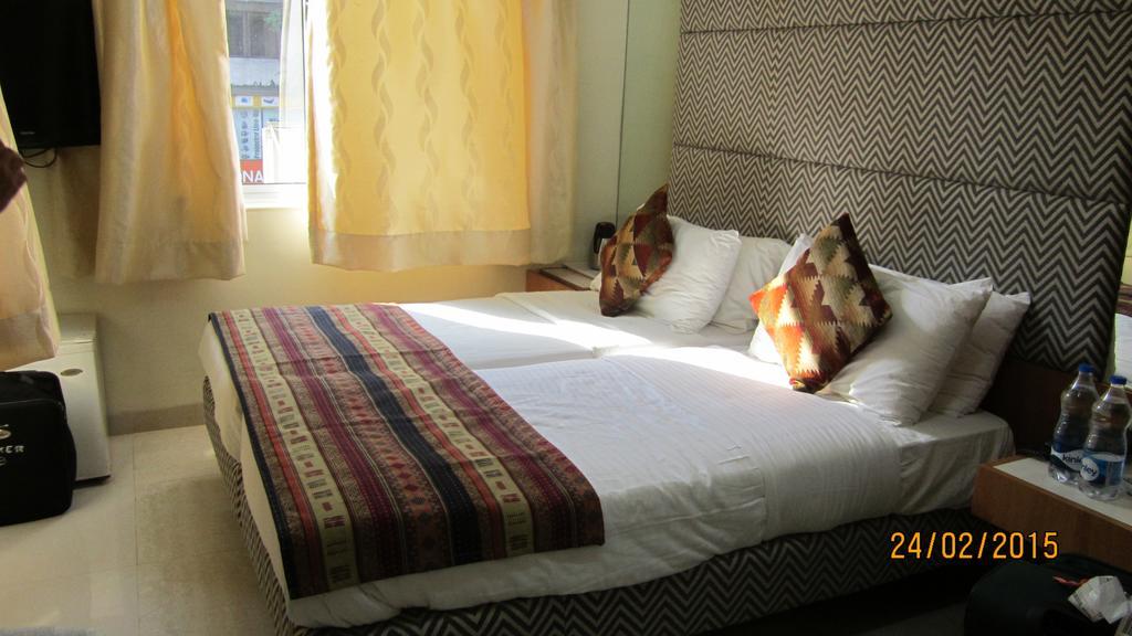 Empire Hotel Мумбай Стая снимка